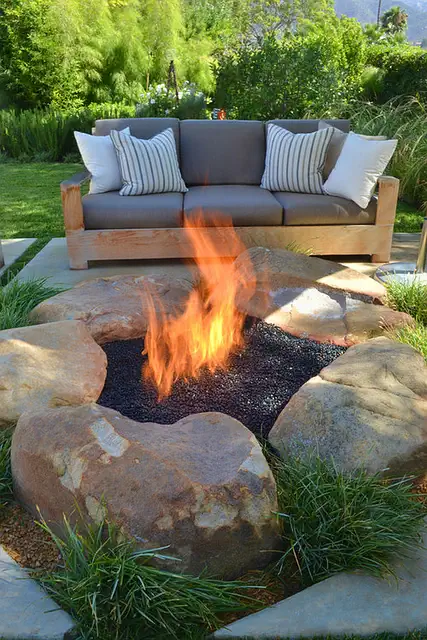 boulders-contemporary-patio-with-rustic-firepit