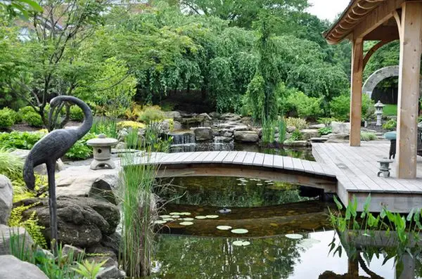 backyard-retreat-wood-arched-bridge