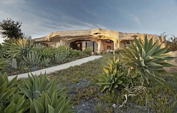 Flintstone-style-house-mountain-rock-building-architecture