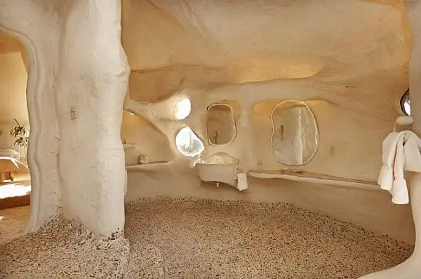 Flintstone-style-house-mountain-rock-building-bath