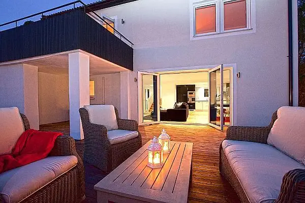 family-villa-sale-patio-night