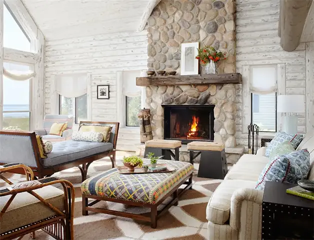 river-rocks-fireplace-and-whitewashed-walls