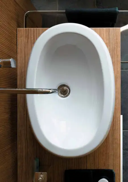 wooden-batroom-cabinets-and-oval-ceramics-12-554x787