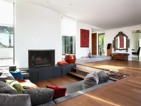 sunken-living-room-design-near-fireplace