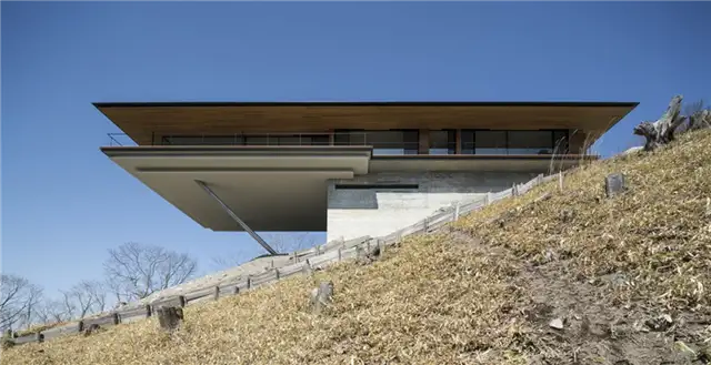 Плавательные бассейны в бетонном доме The Wall House от Guedes Cruz Arquitectos