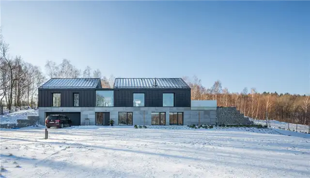 Двускатный дом в стиле амбар от Kropka Studio - бетонное основание