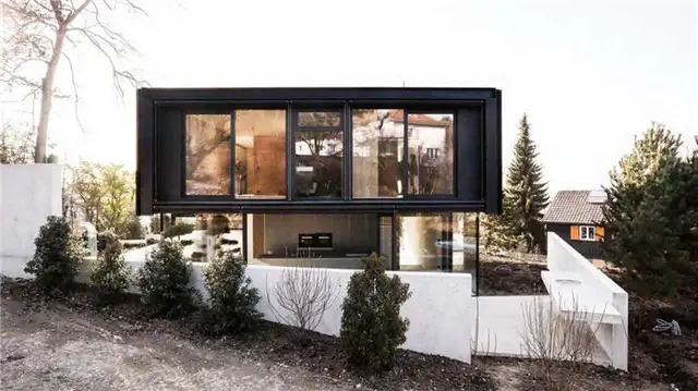 Дом в швейцарском Риене от Reuter Raeber Architects - окна