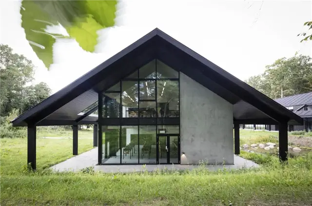 Дом охоты двускатная крыша Arkitema Architects
