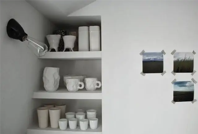 tiny-attic-apartment-paris-kitchen-built-shelves