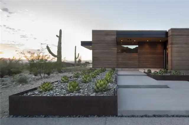 Современный дом Rammed Earth от Brent Kendle вид сбоку