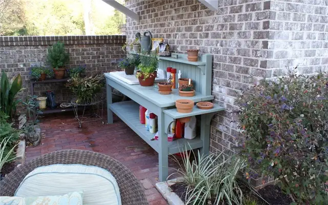 old-bench-into-a-potting-table