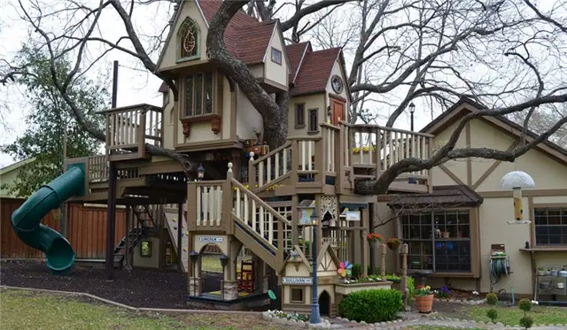 amazing-backyard-treehouse-with-slide
