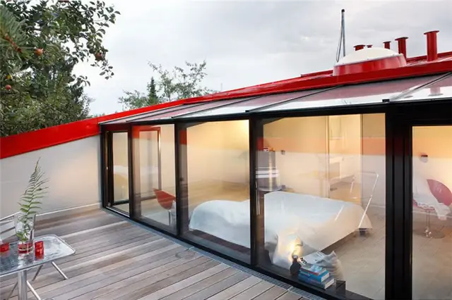 red-house-in-munich-bedroom-terrace