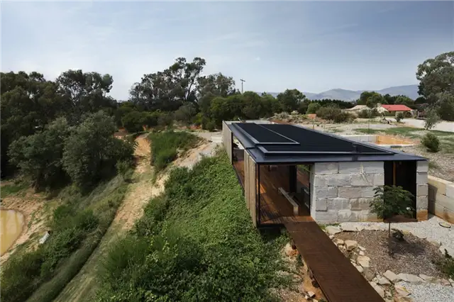 Расположение и крыша дома SawMill House