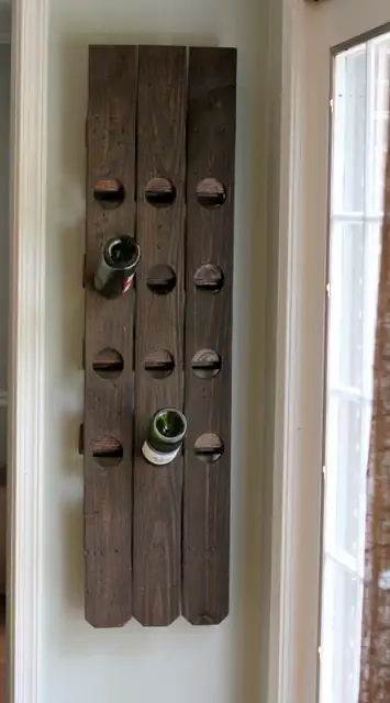 diy-wall-mount-riddling-wine-rack-from-a-fence-1-500x902