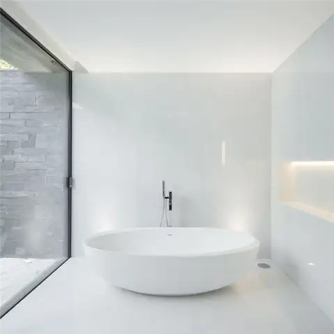 Дом Fraiao в Португалии от Trama Arquitetos - отдельно стоящая ванна