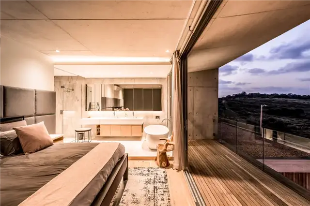 Дом в Южной Африке от Bloc Architects - спальня с открытым пространством