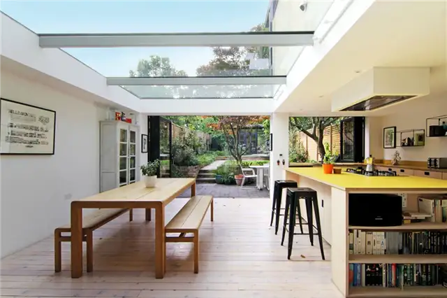 London House Extension - The Coach House by Studio 30 Architects - желтая кухонная столешница