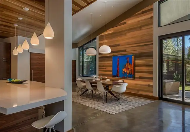sage-architecture-flight-house-dining-area-carpet-under-table-framed-wall-art