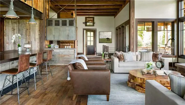 Ранчо Rustic Colorado Ranch от Axial Art Architecture в сотрудничестве с rebaL Design - гостиная зона со столом из строганного бревна