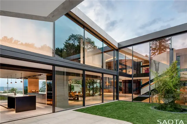 Швейцария Вилла Courbe by Saota - зеленая растительность