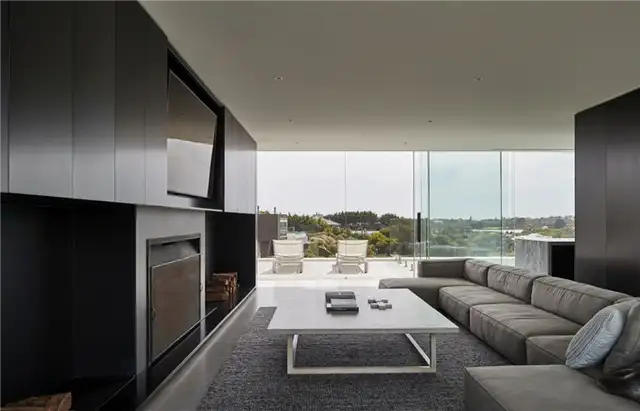 Современный дом с плоской крышей Wildcoast в Австралии от FGR Architects - гостиная
