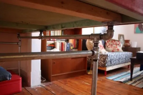 diy-desk-of-salvaged-door-and-pipes2