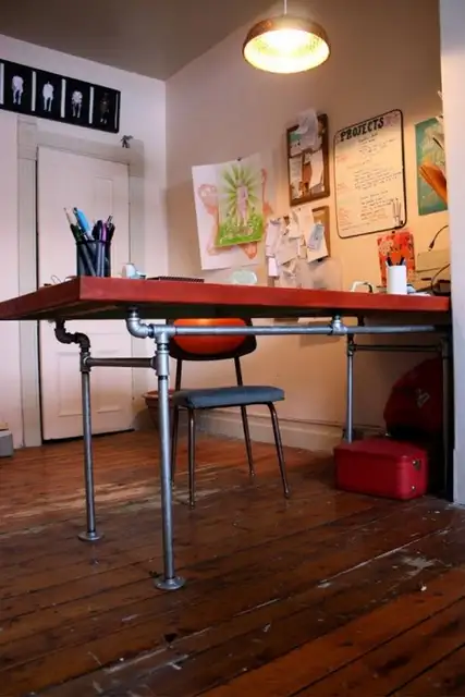 diy-desk of-salvaged-door-and-pipes