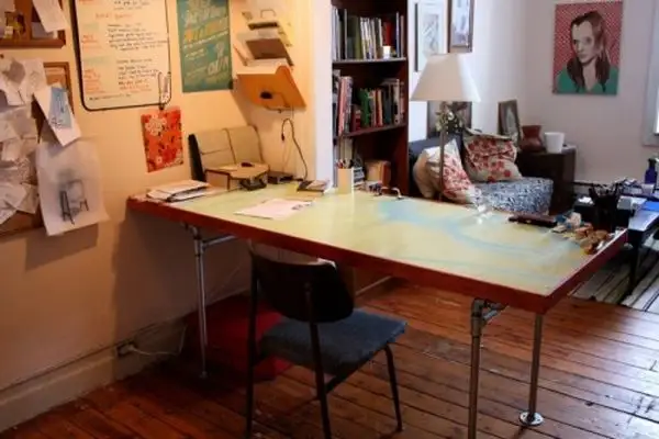 diy-desk-of-salvaged-door-and-pipes1
