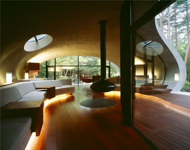Подвесной камин Shell с изогнутым потолком от ARTechnic architects