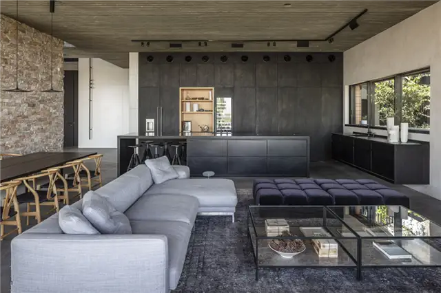 Contemporary Stone Cladding Villa by Dana Oberson Architects - кухонный остров