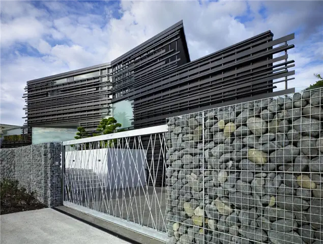 Дом Глендоуи с габионным забором Bossley Architects