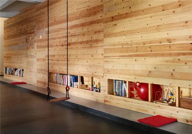 ocean-room-swing-and-timber-walls