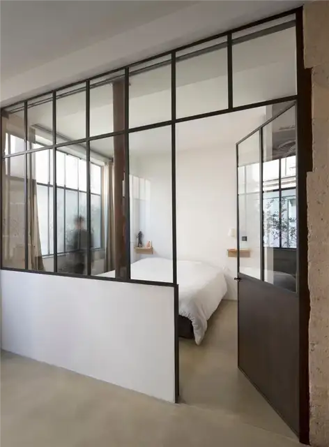 paris-loft-renovation-bedroom-glass-walls