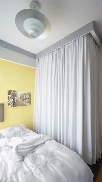 Tiny-apartment-Singapore-bedroom-curtains