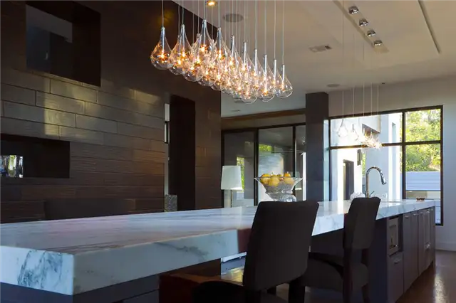 Larmes-Modern-Clear-Teardrop-Glass-Linear-Pendant-Over-kitchen