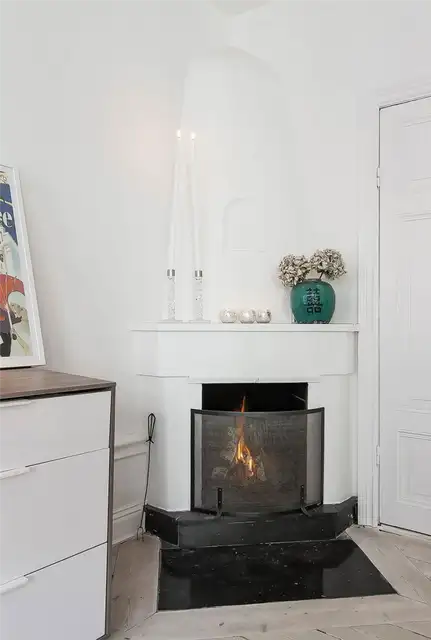 Small-Flat-in-Stockholm-Corner-Fireplace